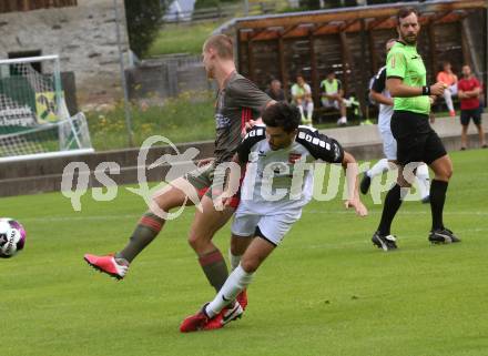 Fussball 1. Klasse B. Kleinkirchheim gegen Velden. Mario Hubert Trattler  (Kleinkirchheim),    Roland Putsche (Velden). Kleinkirchheim, am 25.7.2021.
Foto: Kuess
---
pressefotos, pressefotografie, kuess, qs, qspictures, sport, bild, bilder, bilddatenbank