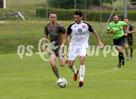 Fussball 1. Klasse B. Kleinkirchheim gegen Velden. Mario Dilberovic  (Kleinkirchheim),  Roland Putsche (Velden). Kleinkirchheim, am 25.7.2021.
Foto: Kuess
---
pressefotos, pressefotografie, kuess, qs, qspictures, sport, bild, bilder, bilddatenbank