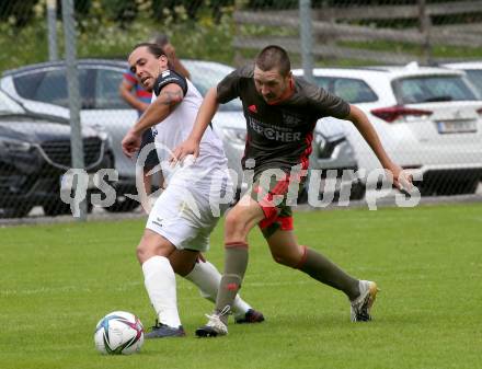 Fussball 1. Klasse B. Kleinkirchheim gegen Velden. Johannes Karl Mitter  (Kleinkirchheim),  Gerfried Einspieler  (Velden). Kleinkirchheim, am 25.7.2021.
Foto: Kuess
---
pressefotos, pressefotografie, kuess, qs, qspictures, sport, bild, bilder, bilddatenbank