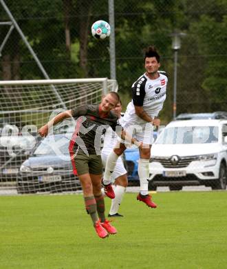 Fussball 1. Klasse B. Kleinkirchheim gegen Velden.  Mario Hubert Trattler (Kleinkirchheim), Roland Putsche  (Velden). Kleinkirchheim, am 25.7.2021.
Foto: Kuess
---
pressefotos, pressefotografie, kuess, qs, qspictures, sport, bild, bilder, bilddatenbank