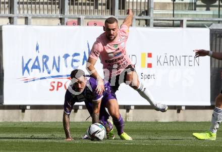 Fussball. Bundesliga. SK Austria Klagenfurt gegen TSV Hartberg.   Philipp Huetter, (Klagenfurt), Juergen Heil  (Hartberg). Klagenfurt, am 7.8.2021.
Foto: Kuess
www.qspictures.net
---
pressefotos, pressefotografie, kuess, qs, qspictures, sport, bild, bilder, bilddatenbank