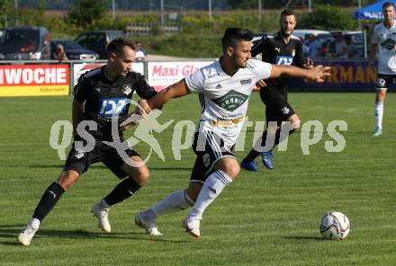 Fussball Kaerntner Liga. Bleiburg gegen St. Michael/Bl..  Ziga Korpar
 (Bleiburg),   Senad Jahic (St. Michael/Bl.). Bleiburg, am 14.8.2021.
Foto: Kuess
---
pressefotos, pressefotografie, kuess, qs, qspictures, sport, bild, bilder, bilddatenbank