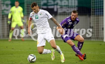 Fussball. Bundesliga. SK Austria Klagenfurt gegen WSG Tirol.  Turgay Gemicibasi (Klagenfurt), Giacomo Vrioni (Tirol). Klagenfurt, am 28.8.2021.
Foto: Kuess
www.qspictures.net
---
pressefotos, pressefotografie, kuess, qs, qspictures, sport, bild, bilder, bilddatenbank