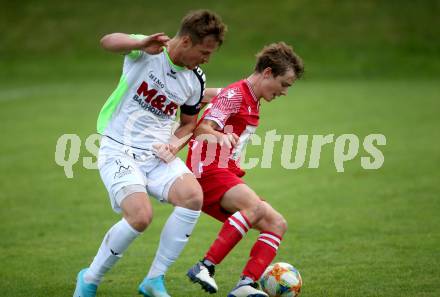 Fussball Kaerntner Liga. St. Andrae/WAC Juniors gegen Feldkirchen.  Florian Tobias Zavodnik  (St. Andrae),  Sebastian Schmid (Feldkirchen). St. Andrae, am 27.8.2021.
Foto: Kuess
---
pressefotos, pressefotografie, kuess, qs, qspictures, sport, bild, bilder, bilddatenbank