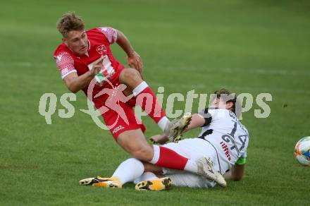 Fussball Kaerntner Liga. St. Andrae/WAC Juniors gegen Feldkirchen.  Paul Staudinger (St. Andrae),   Robert Thomas Tiffner (Feldkirchen). St. Andrae, am 27.8.2021.
Foto: Kuess
---
pressefotos, pressefotografie, kuess, qs, qspictures, sport, bild, bilder, bilddatenbank