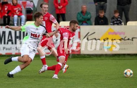 Fussball Kaerntner Liga. St. Andrae/WAC Juniors gegen Feldkirchen. Michael Six   (St. Andrae), Nikola Pavicevic  (Feldkirchen). St. Andrae, am 27.8.2021.
Foto: Kuess
---
pressefotos, pressefotografie, kuess, qs, qspictures, sport, bild, bilder, bilddatenbank