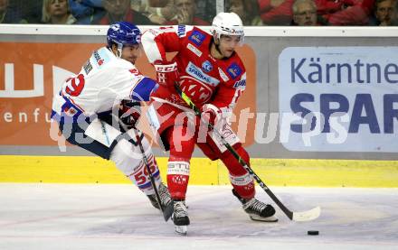 EBEL. Eishockey Bundesliga. KAC gegen	HC TIWAG Innsbruck. Lukas Haudum,  (KAC), Joel Messner  (Innsbruck). Klagenfurt, am 18.9.2021.
Foto: Kuess
www.qspictures.net

---
pressefotos, pressefotografie, kuess, qs, qspictures, sport, bild, bilder, bilddatenbank