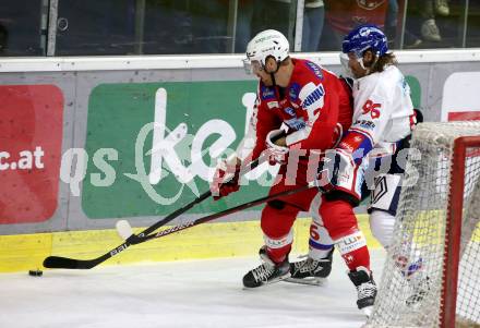 EBEL. Eishockey Bundesliga. KAC gegen	HC TIWAG Innsbruck. Phillip Bruggisser,  (KAC),  Martin Ulmer (Innsbruck). Klagenfurt, am 18.9.2021.
Foto: Kuess
www.qspictures.net

---
pressefotos, pressefotografie, kuess, qs, qspictures, sport, bild, bilder, bilddatenbank