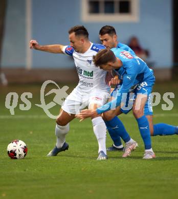 Fussball OEFB Cup. Treibach gegen FAC Wien.   Vahid Muharemovic,  (Treibach), Mirnes Becirovic,  David Ungar  (FAC). Treibach, am 21.9.2021.
Foto: Kuess
---
pressefotos, pressefotografie, kuess, qs, qspictures, sport, bild, bilder, bilddatenbank