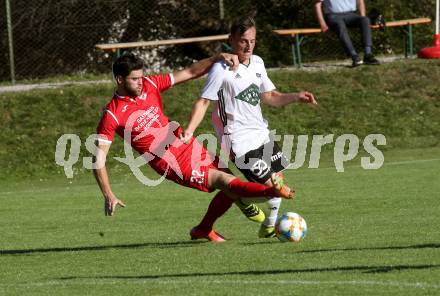 Fussball. Kaerntner Liga. Ferlach Atus gegen St. Michael/Bl.. Stephan Buergler  (Ferlach),   Mathias Stefan Mueller (St. Michael). Ferlach, am 25.9.2021.
Foto: Kuess
www.qspictures.net
---
pressefotos, pressefotografie, kuess, qs, qspictures, sport, bild, bilder, bilddatenbank