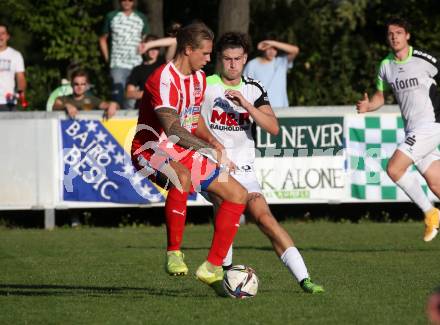 Fussball. Kaerntner Liga. KAC 1909 gegen Feldkirchen SV.  Frederic Niederbacher  (KAC), Adriano Bilandzija (Feldkirchen). Klagenfurt, am 25.9.2021.
Foto: Kuess
www.qspictures.net
---
pressefotos, pressefotografie, kuess, qs, qspictures, sport, bild, bilder, bilddatenbank