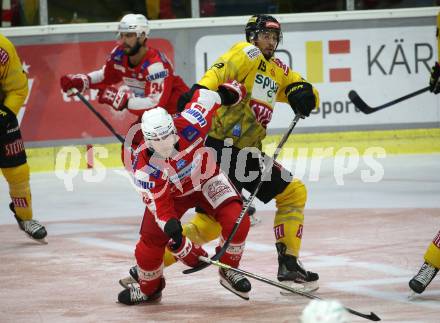 EBEL. Eishockey Bundesliga. KAC gegen	spusu Vienna Capitals. Stefan Geier,  (KAC), Brody Sutter  (Vienna Capitals). Klagenfurt, am 1.10.2021.
Foto: Kuess
www.qspictures.net

---
pressefotos, pressefotografie, kuess, qs, qspictures, sport, bild, bilder, bilddatenbank