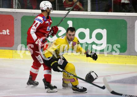 EBEL. Eishockey Bundesliga. KAC gegen	spusu Vienna Capitals. Kele Steffler,  (KAC), Luke Moncada  (Vienna Capitals). Klagenfurt, am 1.10.2021.
Foto: Kuess
www.qspictures.net

---
pressefotos, pressefotografie, kuess, qs, qspictures, sport, bild, bilder, bilddatenbank