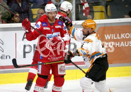 EBEL. Eishockey Bundesliga. KAC gegen	Black Wings Linz. Philip Bruggisser, (KAC), Rafael Rotter   (Linz). Klagenfurt, am 8.10.2021.
Foto: Kuess
www.qspictures.net

---
pressefotos, pressefotografie, kuess, qs, qspictures, sport, bild, bilder, bilddatenbank