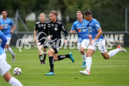 Fussball Testspiel. SK Austria Klagenfurt gegen NK Bravo (SLO). Patrick Greil,  (Klagenfurt), Gasper Trdin (SLO). Sportpark Fischl. Klagenfurt, am 8.10.2021.
Foto: Kuess
---
pressefotos, pressefotografie, kuess, qs, qspictures, sport, bild, bilder, bilddatenbank