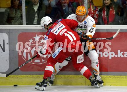 EBEL. Eishockey Bundesliga. KAC gegen	Black Wings Linz. Lukas Haudum,  (KAC), Ramon Schnetzer  (Linz). Klagenfurt, am 8.10.2021.
Foto: Kuess
www.qspictures.net

---
pressefotos, pressefotografie, kuess, qs, qspictures, sport, bild, bilder, bilddatenbank