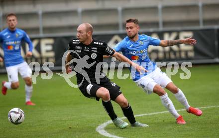 Fussball Testspiel. SK Austria Klagenfurt gegen NK Bravo (SLO).    Nicolas Wimmer (Klagenfurt), Miha Kancilija (SLO). Sportpark Fischl. Klagenfurt, am 8.10.2021.
Foto: Kuess
---
pressefotos, pressefotografie, kuess, qs, qspictures, sport, bild, bilder, bilddatenbank