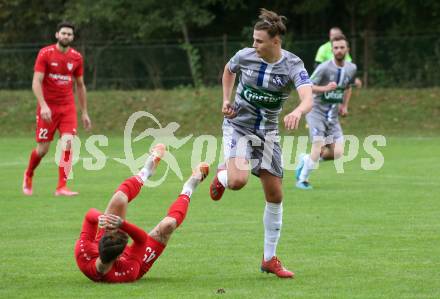 Fussball. Kaerntner Liga. Ferlach Atus gegen Dellach/Gail. Christopher Katschnig  (Ferlach), Christopher Schaller  (Dellach). Ferlach, am 9.10.2021.
Foto: Kuess
www.qspictures.net
---
pressefotos, pressefotografie, kuess, qs, qspictures, sport, bild, bilder, bilddatenbank