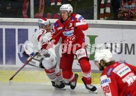 EBEL. Eishockey Bundesliga. KAC gegen	iClinic Bratislava Capitals. Nicholas Eric Petersen,  (KAC),  Samuel Fereta (Bratislava). Klagenfurt, am 15.10.2021.
Foto: Kuess
www.qspictures.net

---
pressefotos, pressefotografie, kuess, qs, qspictures, sport, bild, bilder, bilddatenbank