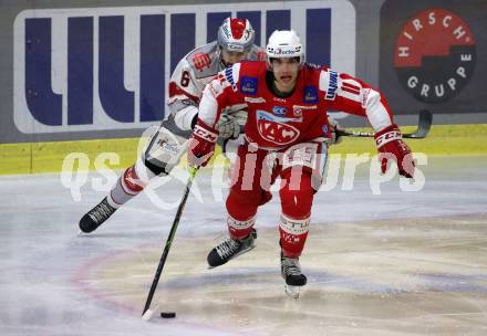 EBEL. Eishockey Bundesliga. KAC gegen	iClinic Bratislava Capitals. Lukas Haudum,  (KAC), David Levin  (Bratislava). Klagenfurt, am 15.10.2021.
Foto: Kuess
www.qspictures.net

---
pressefotos, pressefotografie, kuess, qs, qspictures, sport, bild, bilder, bilddatenbank