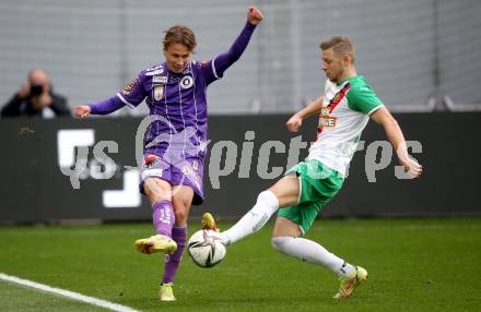 Fussball. Bundesliga. SK Austria Klagenfurt gegen  SK Rapid. Alex Timossi Andersson,   (Klagenfurt), Marco Gruell (SK Rapid). Klagenfurt, am 16.10.2021.
Foto: Kuess
www.qspictures.net
---
pressefotos, pressefotografie, kuess, qs, qspictures, sport, bild, bilder, bilddatenbank