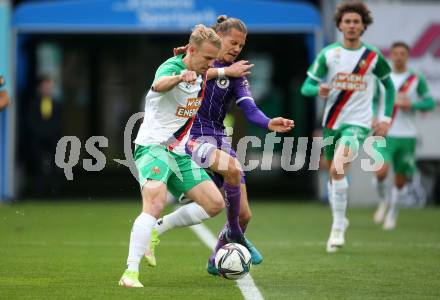 Fussball. Bundesliga. SK Austria Klagenfurt gegen  SK Rapid.  Patrick Greil, (Klagenfurt), Marco Gruell  (SK Rapid). Klagenfurt, am 16.10.2021.
Foto: Kuess
www.qspictures.net
---
pressefotos, pressefotografie, kuess, qs, qspictures, sport, bild, bilder, bilddatenbank