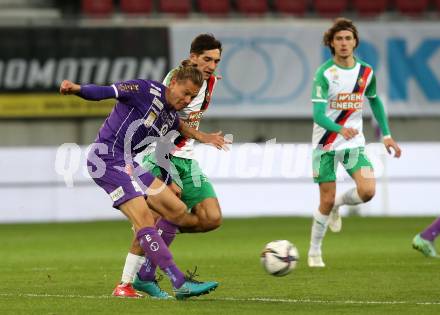 Fussball. Bundesliga. SK Austria Klagenfurt gegen  SK Rapid.  Patrick Greil,  (Klagenfurt), Leo Greiml (SK Rapid). Klagenfurt, am 16.10.2021.
Foto: Kuess
www.qspictures.net
---
pressefotos, pressefotografie, kuess, qs, qspictures, sport, bild, bilder, bilddatenbank