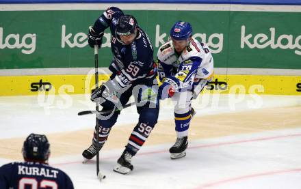 EBEL. Eishockey Bundesliga. VSV gegen Fehervar AV19.  Felix Maxa,  (VSV),  Joshua Atkinson (Fehervar AV19). Villach, am 26.10.2021.
Foto: Kuess
www.qspictures.net
---
pressefotos, pressefotografie, kuess, qs, qspictures, sport, bild, bilder, bilddatenbank