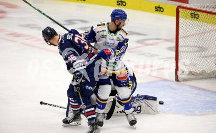 EBEL. Eishockey Bundesliga. VSV gegen Fehervar AV19.  Brett Flemming, (VSV), Csanad Erdely   (Fehervar AV19). Villach, am 26.10.2021.
Foto: Kuess
www.qspictures.net
---
pressefotos, pressefotografie, kuess, qs, qspictures, sport, bild, bilder, bilddatenbank