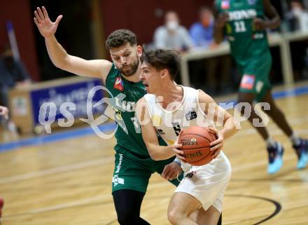 Basketball Zweite Liga 2021/2022. Grunddurchgang 4. Runde.  Woerthersee Piraten gegen Dornbirn Lions. Felix Leindecker (Piraten), Panagiotis Zaraidonis  (Dornbirn). Klagenfurt, am 30.10.2021.
Foto: Kuess
www.qspictures.net

---
pressefotos, pressefotografie, kuess, qs, qspictures, sport, bild, bilder, bilddatenbank