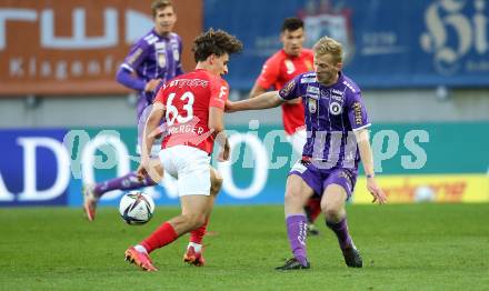 Fussball. Bundesliga. SK Austria Klagenfurt gegen  FC Flyeralarm Admira.   Christopher Cvetko, (Klagenfurt),  Luca Kronberger  (Admira). Klagenfurt, am 30.10.2021.
Foto: Kuess
www.qspictures.net
---
pressefotos, pressefotografie, kuess, qs, qspictures, sport, bild, bilder, bilddatenbank