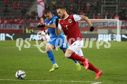 Fussball. FIFA. WM Qualifikationsspiel. European Qualifiers. Oesterreich gegen Israel.  Marko Arnautovic, (Oesterreich),  Eyad Abu Abaid  (Isarael). Klagenfurt, Woerthersee Stadion, 12.11.2021.
Foto: Kuess
www.qspictures.net
---
pressefotos, pressefotografie, kuess, qs, qspictures, sport, bild, bilder, bilddatenbank