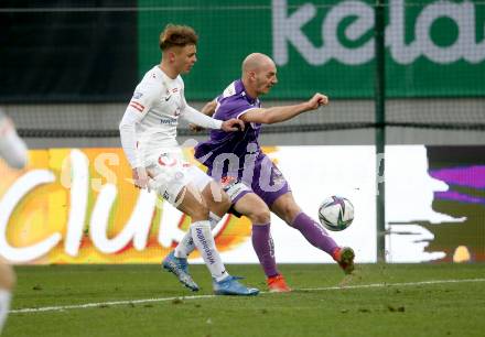 Fussball. Bundesliga. SK Austria Klagenfurt gegen  FK Austria Wien.    Nicolas Wimmer (Klagenfurt), Muharem Huskovic (Wien). Klagenfurt, am 21.11.2021.
Foto: Kuess
www.qspictures.net
---
pressefotos, pressefotografie, kuess, qs, qspictures, sport, bild, bilder, bilddatenbank