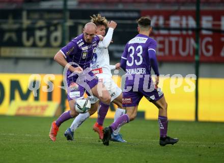 Fussball. Bundesliga. SK Austria Klagenfurt gegen  FK Austria Wien.    Nicolas Wimmer (Klagenfurt), Muharem Huskovic (Wien). Klagenfurt, am 21.11.2021.
Foto: Kuess
www.qspictures.net
---
pressefotos, pressefotografie, kuess, qs, qspictures, sport, bild, bilder, bilddatenbank