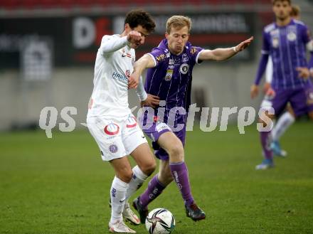 Fussball. Bundesliga. SK Austria Klagenfurt gegen  FK Austria Wien.   Christopher Brian Cvetko (Klagenfurt), Vesel Demaku (Wien). Klagenfurt, am 21.11.2021.
Foto: Kuess
www.qspictures.net
---
pressefotos, pressefotografie, kuess, qs, qspictures, sport, bild, bilder, bilddatenbank