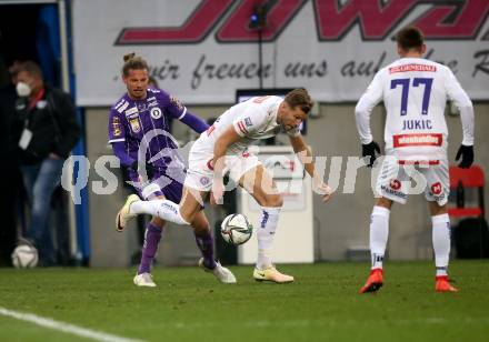 Fussball. Bundesliga. SK Austria Klagenfurt gegen  FK Austria Wien.   Patrick Greil (Klagenfurt), Alexander Gruenwald (Wien). Klagenfurt, am 21.11.2021.
Foto: Kuess
www.qspictures.net
---
pressefotos, pressefotografie, kuess, qs, qspictures, sport, bild, bilder, bilddatenbank