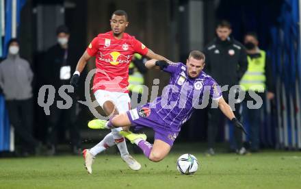 Fussball. Bundesliga. SK Austria Klagenfurt gegen  FC Red Bull Salzburg.   Turgay Gemicibasi,  (Klagenfurt),  Antoine Joseph Emmanuel Bernede (Salzburg ). Klagenfurt, am 27.11.2021.
Foto: Kuess
www.qspictures.net
---
pressefotos, pressefotografie, kuess, qs, qspictures, sport, bild, bilder, bilddatenbank