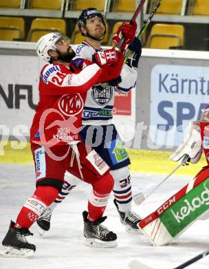 EBEL. Eishockey Bundesliga. KAC gegen	Hydro Fehervar AV 19. Steven Strong,  (KAC), Csanad Erdely  (Fehervar). Klagenfurt, am 28.11.2021.
Foto: Kuess
www.qspictures.net

---
pressefotos, pressefotografie, kuess, qs, qspictures, sport, bild, bilder, bilddatenbank