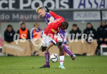 Fussball. Bundesliga. SK Austria Klagenfurt gegen  FC Red Bull Salzburg.   Christopher Cvetko,  (Klagenfurt), Mohamed Camara (Salzburg ). Klagenfurt, am 27.11.2021.
Foto: Kuess
www.qspictures.net
---
pressefotos, pressefotografie, kuess, qs, qspictures, sport, bild, bilder, bilddatenbank