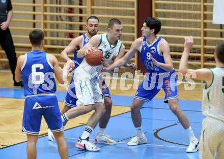 Basketball Zweite Liga 2021/2022. Grunddurchgang 7. Runde.  KOS Celovec gegen Kufstein Towers. Erik Groznik (KOS), Ignacio Trujillo, Dusan Oluic (Kufstein). Klagenfurt, am 27.11.2021.
Foto: Kuess
www.qspictures.net
---
pressefotos, pressefotografie, kuess, qs, qspictures, sport, bild, bilder, bilddatenbank