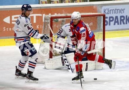 EBEL. Eishockey Bundesliga. KAC gegen	Hydro Fehervar AV 19. Manuel Geier,  (KAC), Dominik Dobmayer  (Fehervar). Klagenfurt, am 28.11.2021.
Foto: Kuess
www.qspictures.net

---
pressefotos, pressefotografie, kuess, qs, qspictures, sport, bild, bilder, bilddatenbank