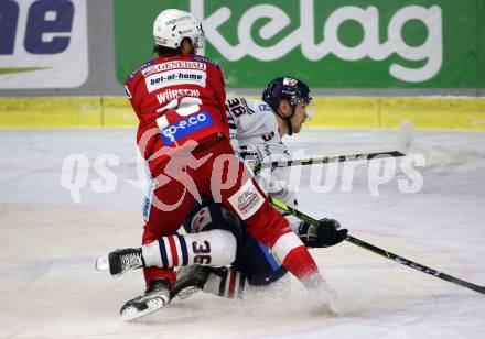 EBEL. Eishockey Bundesliga. KAC gegen	Hydro Fehervar AV 19. Niklas Andre Wuerschl,  (KAC),   Csanad Erdely (Fehervar). Klagenfurt, am 28.11.2021.
Foto: Kuess
www.qspictures.net

---
pressefotos, pressefotografie, kuess, qs, qspictures, sport, bild, bilder, bilddatenbank