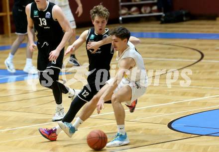 Basketball Zweite Liga 2021/2022. Grunddurchgang 8. Runde.  Woerthersee Piraten gegen RAIDERS Tirol.  Felix Leindecker (KOS), Tim-Joel Deschner  (Tirol). Klagenfurt, am 4.12.2021. 
Foto: Kuess
www.qspictures.net

---
pressefotos, pressefotografie, kuess, qs, qspictures, sport, bild, bilder, bilddatenbank