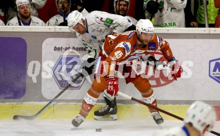 EBEL. Eishockey Bundesliga. KAC gegen	HK SZ Olimpija. Andrej Tavzelj,  (KAC), Anze Ropret  (Olimpija). Klagenfurt, am 7.12.2021.
Foto: Kuess
www.qspictures.net

---
pressefotos, pressefotografie, kuess, qs, qspictures, sport, bild, bilder, bilddatenbank