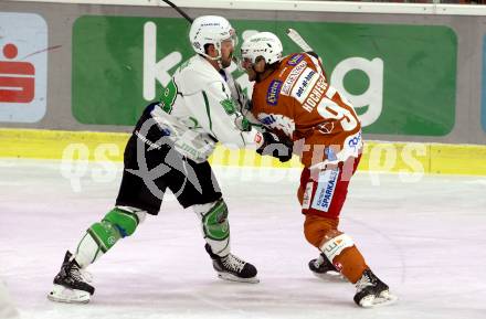 EBEL. Eishockey Bundesliga. KAC gegen	HK SZ Olimpija. Fabian Hochegger,  (KAC), Sebastien Piche  (Olimpija). Klagenfurt, am 7.12.2021.
Foto: Kuess
www.qspictures.net

---
pressefotos, pressefotografie, kuess, qs, qspictures, sport, bild, bilder, bilddatenbank