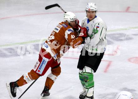 EBEL. Eishockey Bundesliga. KAC gegen	HK SZ Olimpija. Rok Ticar,  (KAC),   Mark Cepon (Olimpija). Klagenfurt, am 7.12.2021.
Foto: Kuess
www.qspictures.net

---
pressefotos, pressefotografie, kuess, qs, qspictures, sport, bild, bilder, bilddatenbank