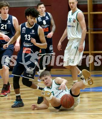 Basketball Zweite Liga 2021/2022. Grunddurchgang 9. Runde.  KOS Celovec gegen BBC Nord Dragonz. Valentin Pasterk (KOS), Kyran Jordan Mc Clure (BBC Nord Dragonz). Klagenfurt, am 11.12.2021.
Foto: Kuess
www.qspictures.net
---
pressefotos, pressefotografie, kuess, qs, qspictures, sport, bild, bilder, bilddatenbank