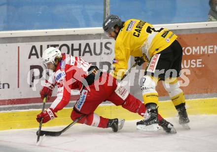 EBEL. Eishockey Bundesliga. KAC gegen	HC Pustertal Woelfe. Daniel Obersteiner,  (KAC),  Michael Caruso (Pustertal). Klagenfurt, am 12.12.2021.
Foto: Kuess
www.qspictures.net

---
pressefotos, pressefotografie, kuess, qs, qspictures, sport, bild, bilder, bilddatenbank