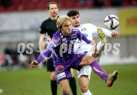 Fussball. Bundesliga. SK Austria Klagenfurt gegen  SK Puntigamer Sturm Graz.  Thomas Roberts,  (Klagenfurt), Alexandar Borkovic (Graz). Klagenfurt, am 12.12.2021.
Foto: Kuess
www.qspictures.net
---
pressefotos, pressefotografie, kuess, qs, qspictures, sport, bild, bilder, bilddatenbank