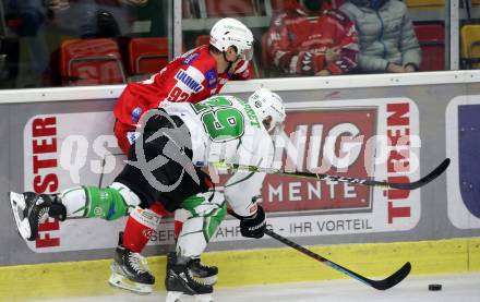 EBEL. Eishockey Bundesliga. KAC gegen	HK SZ Olimpija. Clemens Unterweger,  (KAC), Anze Ropret  (Olimpija). Klagenfurt, am 17.12.2021.
Foto: Kuess
www.qspictures.net

---
pressefotos, pressefotografie, kuess, qs, qspictures, sport, bild, bilder, bilddatenbank